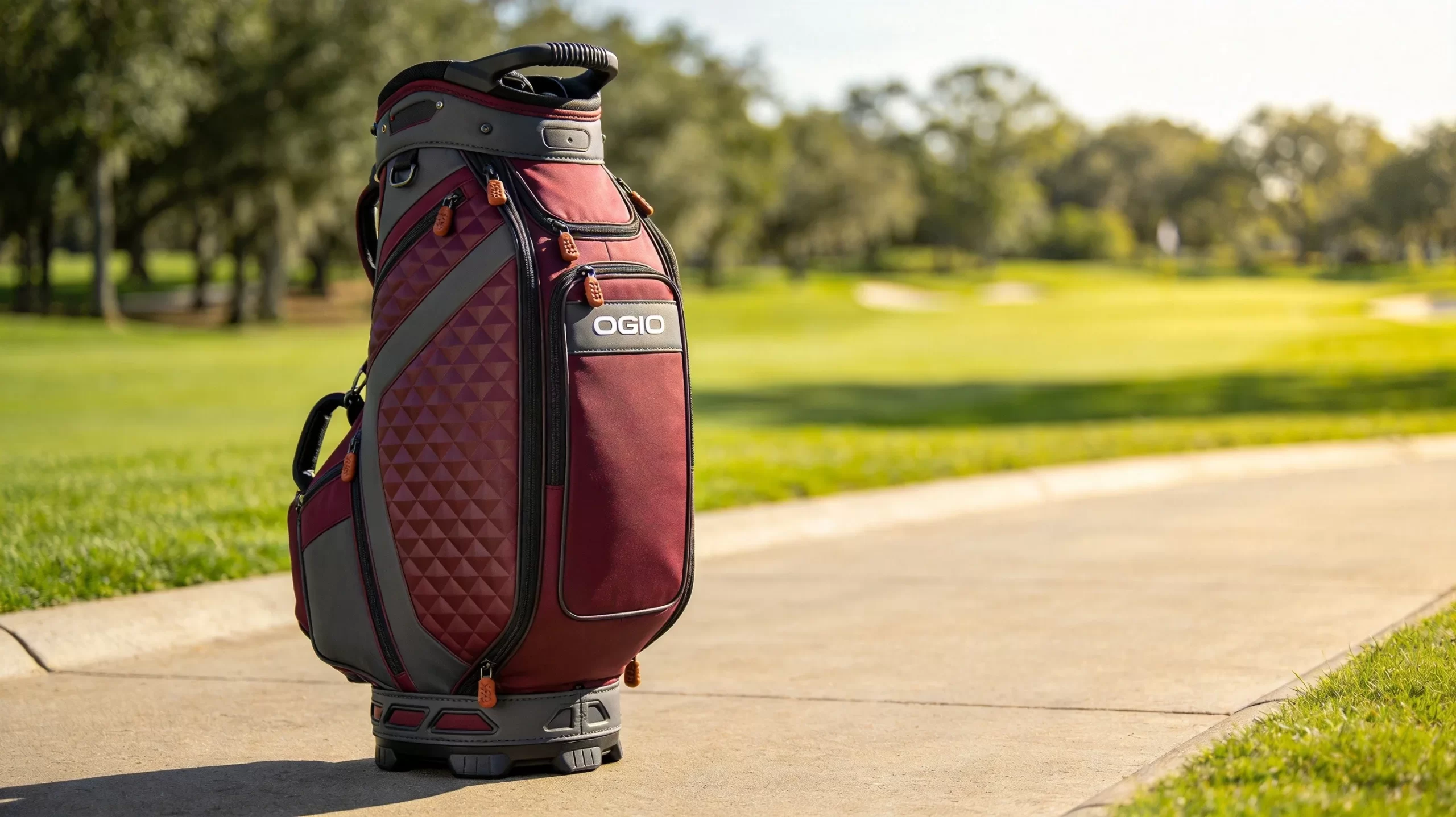 Ogio design-forward cart bag with bold burgundy and charcoal colorway and geometric quilted panels